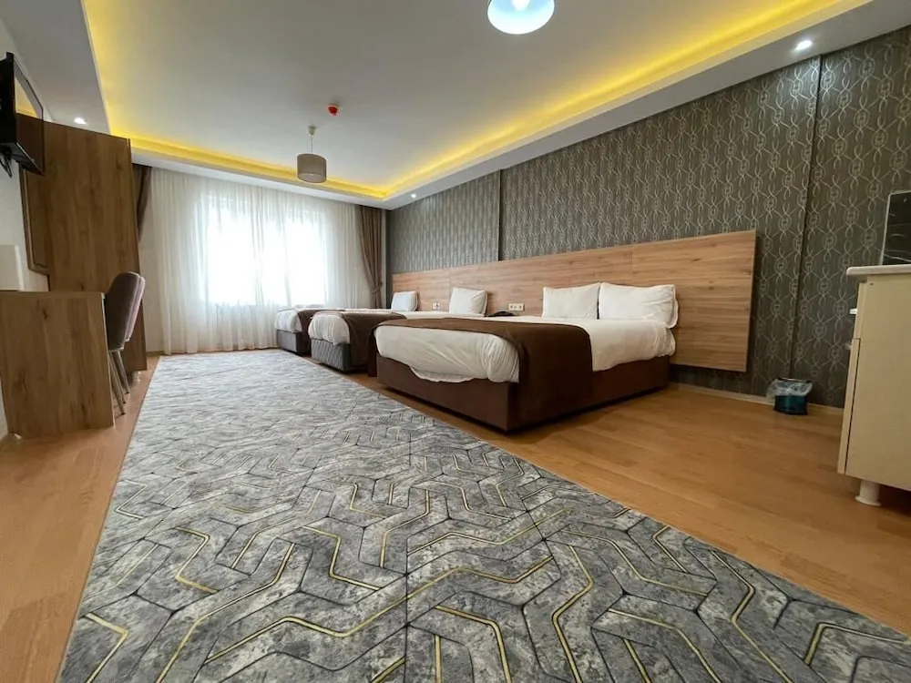 Deluxe Dört Kişilik Oda