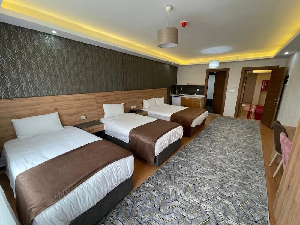Deluxe Dört Kişilik Oda