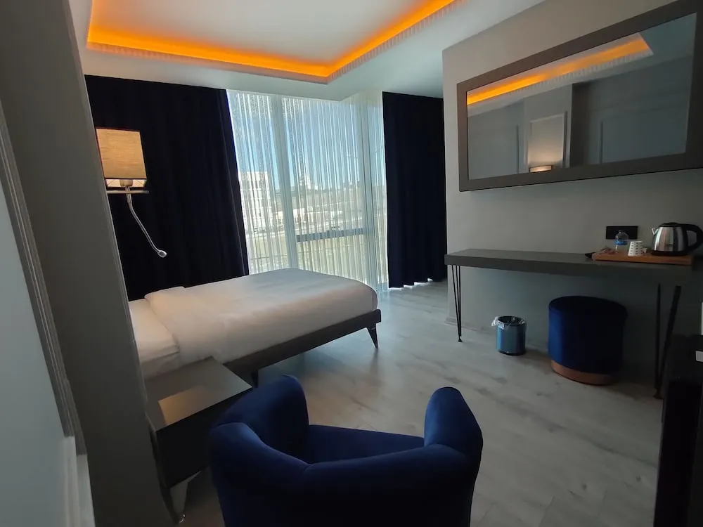 Deluxe Tek Büyük veya İki Ayrı Yataklı Oda