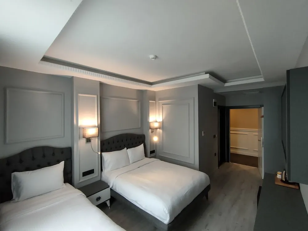 Deluxe Tek Büyük veya İki Ayrı Yataklı Oda