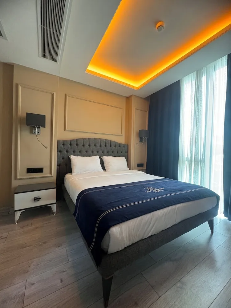 Deluxe Tek Büyük veya İki Ayrı Yataklı Oda