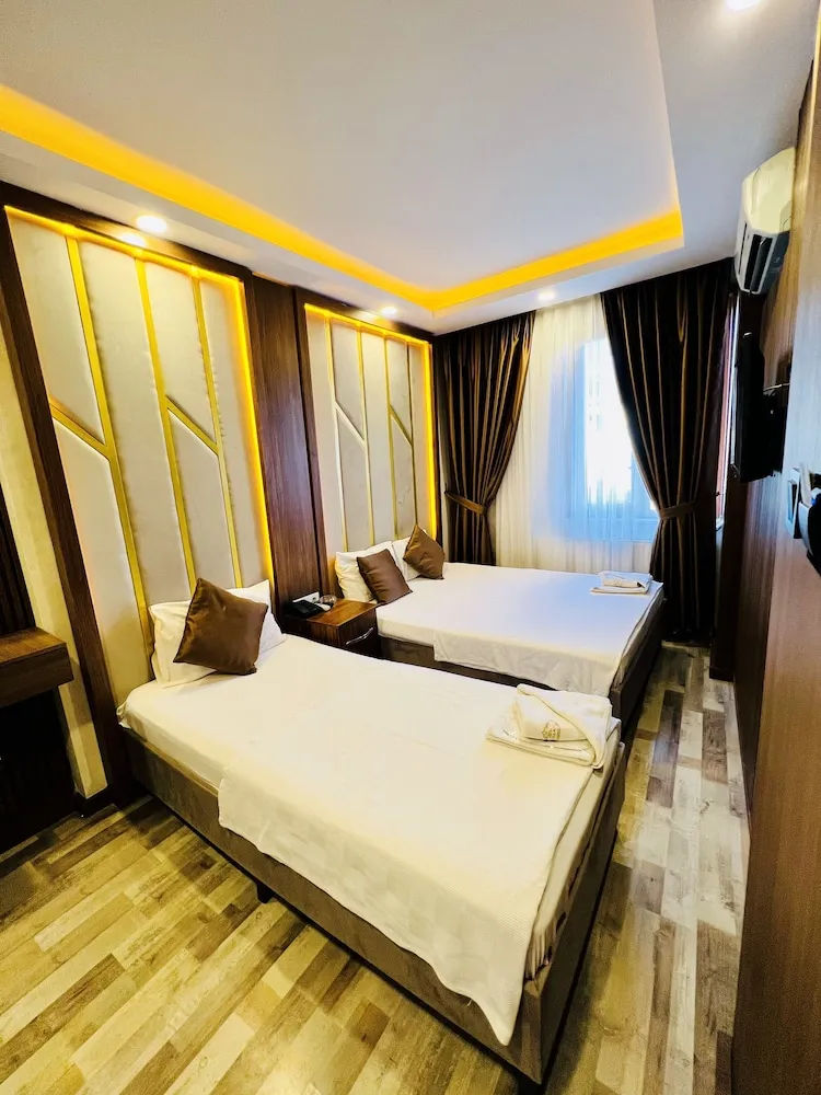 Deluxe Üç Kişilik Oda