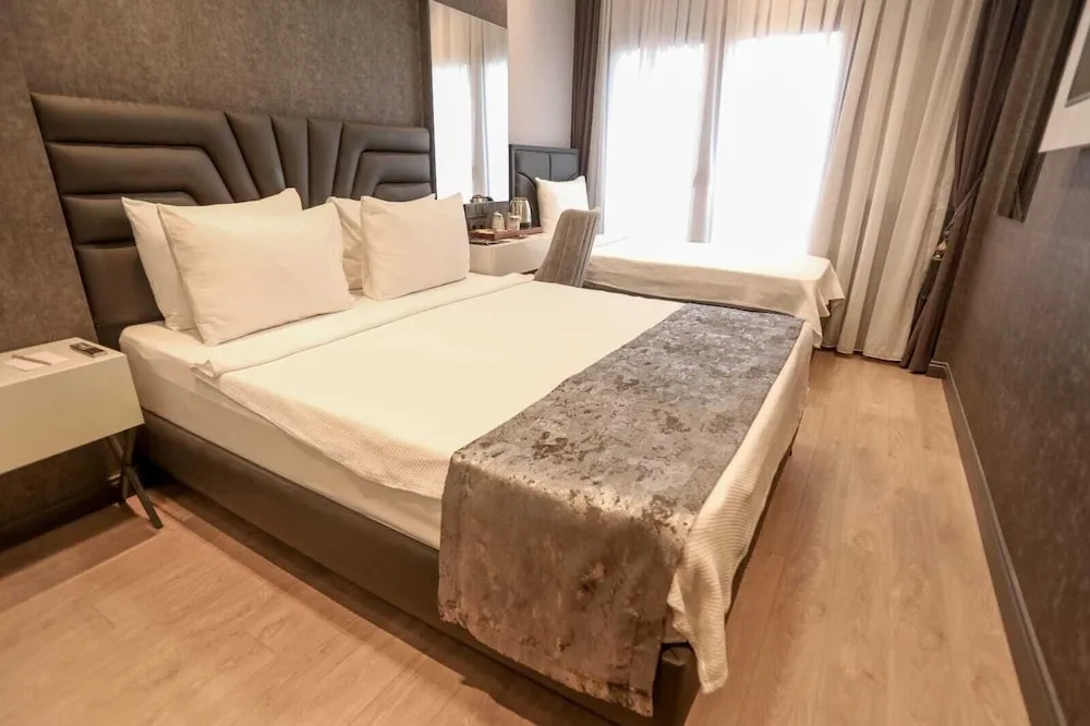 Deluxe Üç Kişilik Oda