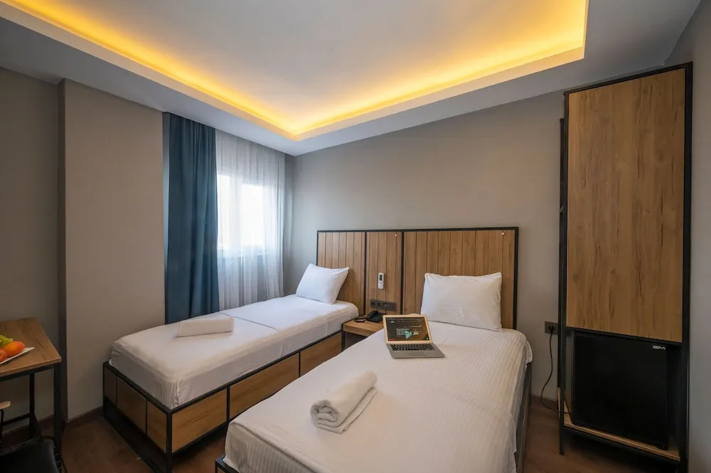 Deluxe Tek Büyük veya İki Ayrı Yataklı Oda