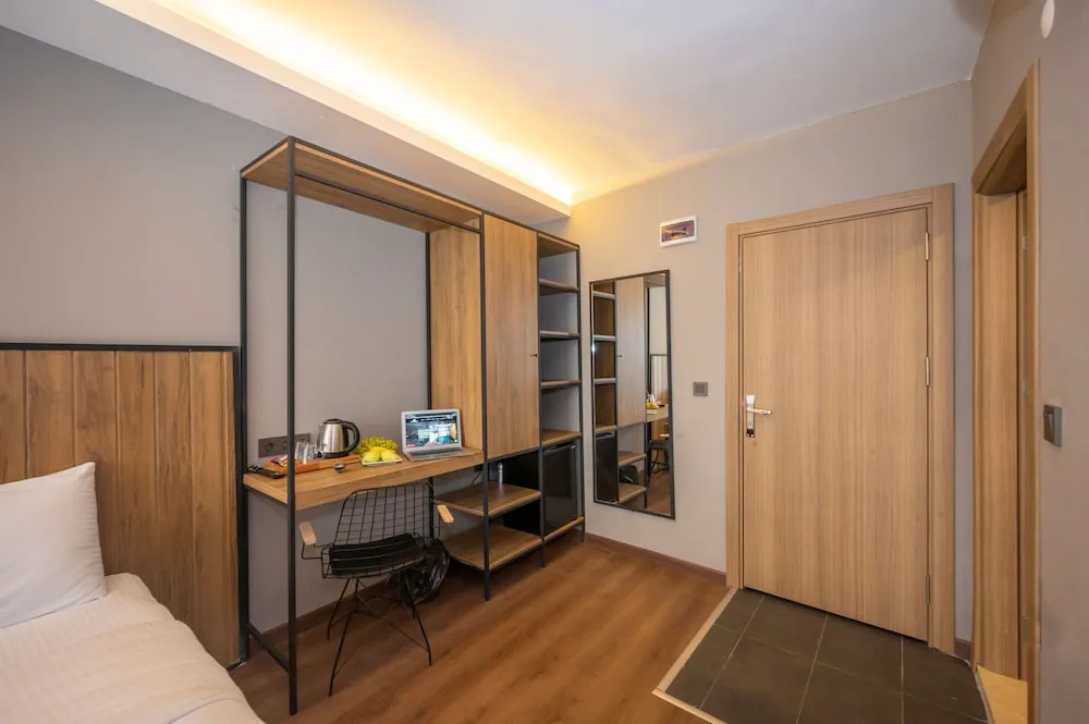 Deluxe Tek Büyük veya İki Ayrı Yataklı Oda