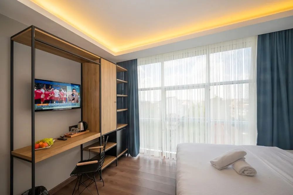 Deluxe Tek Büyük veya İki Ayrı Yataklı Oda