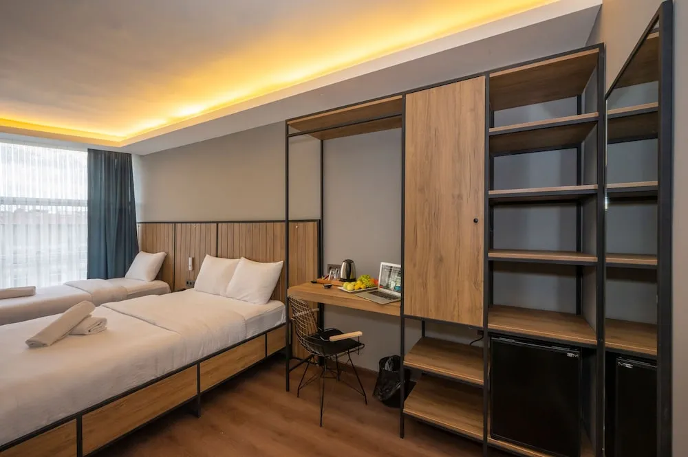 Deluxe Tek Büyük veya İki Ayrı Yataklı Oda