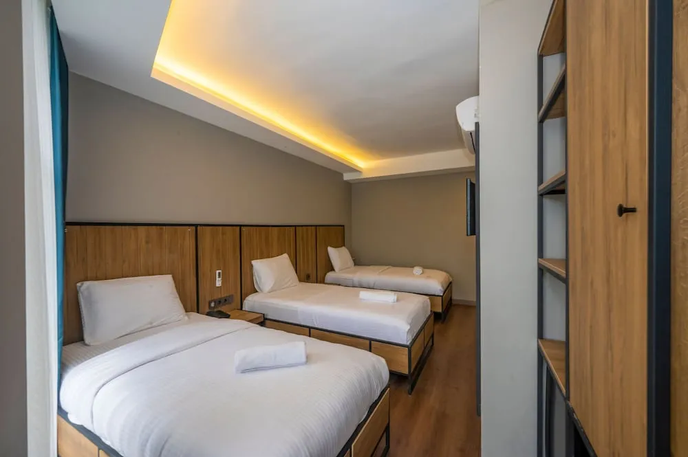Deluxe Üç Kişilik Oda