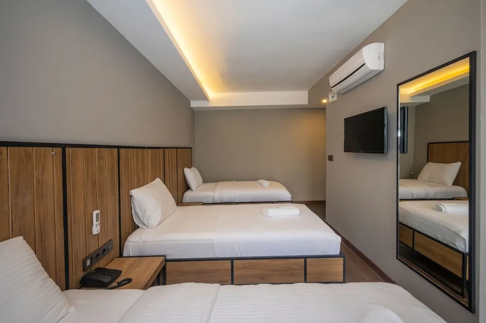 Deluxe Üç Kişilik Oda