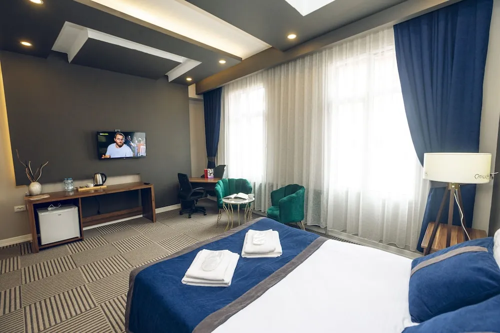 Deluxe Tek Büyük Yataklı Oda