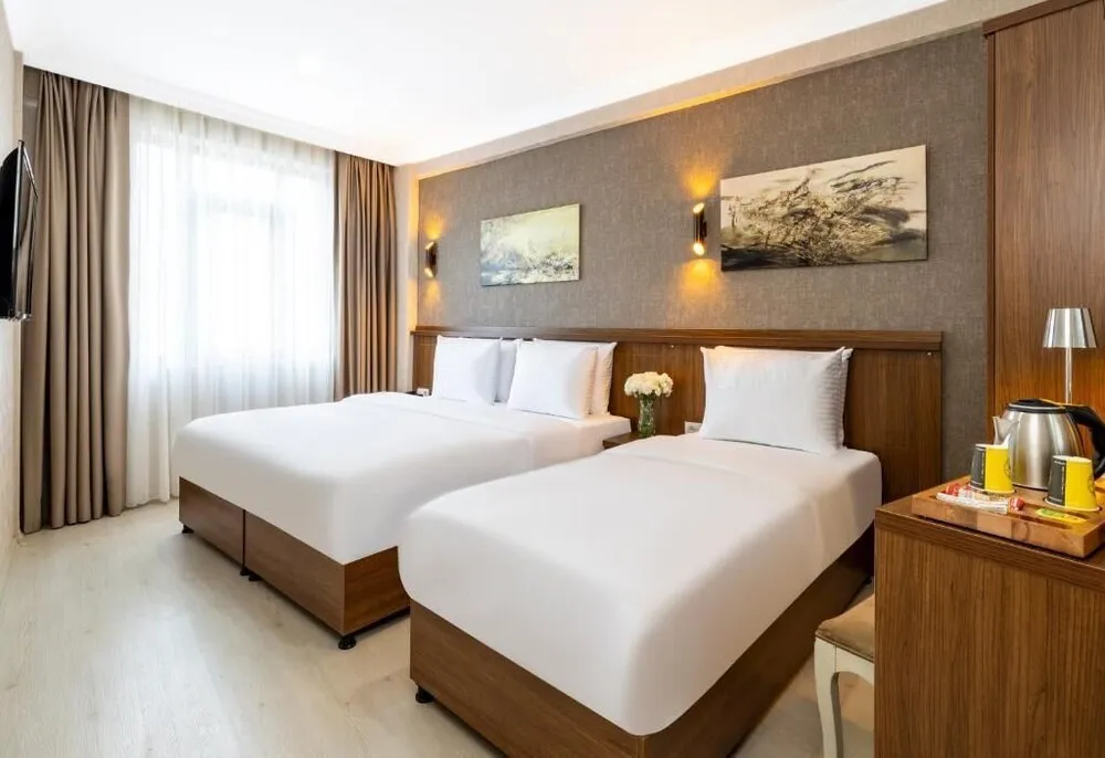 Deluxe Üç Kişilik Oda