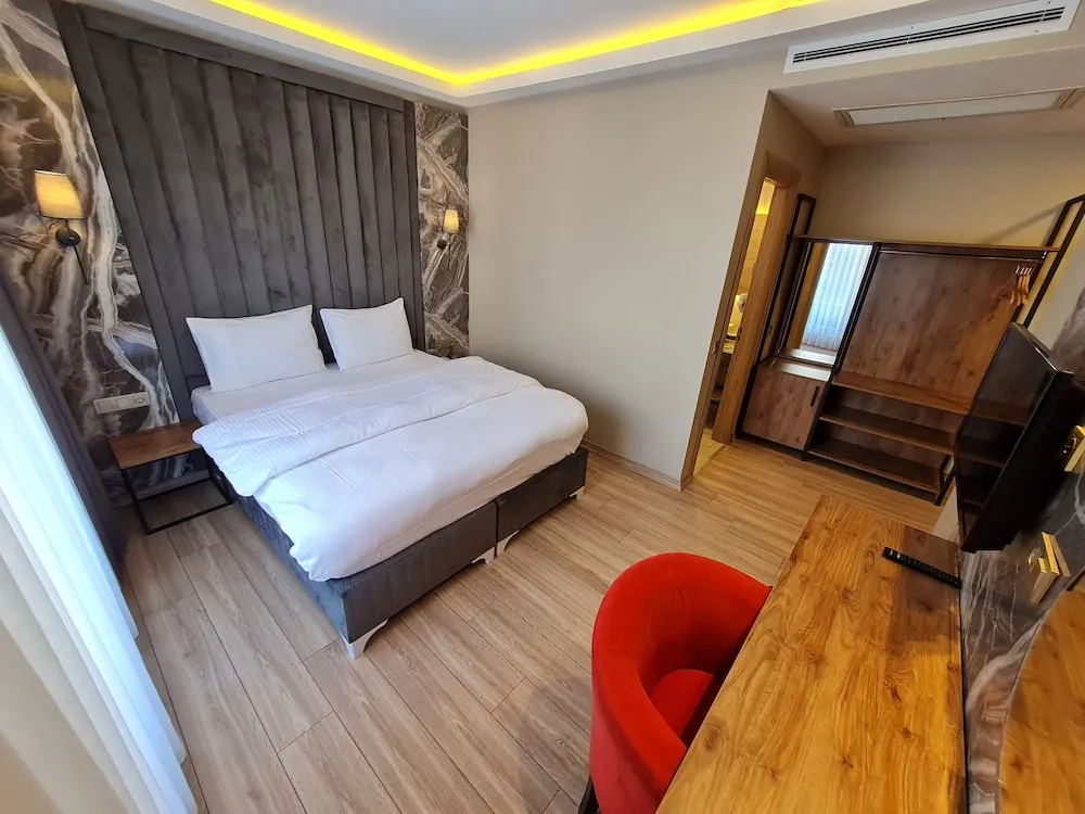 Economy Tek Büyük veya İki Ayrı Yataklı Oda