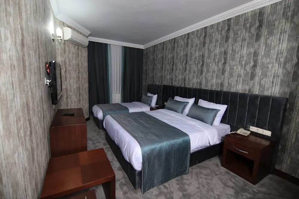 Deluxe Üç Kişilik Oda