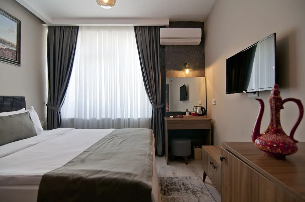 Deluxe Tek Büyük Yataklı Oda