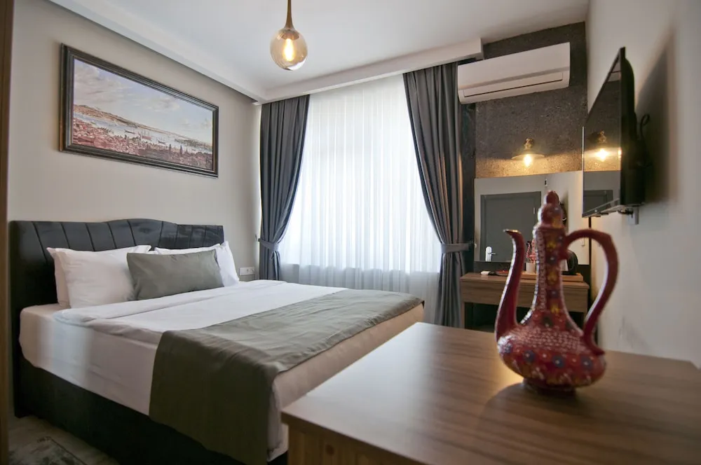 Deluxe Tek Büyük Yataklı Oda