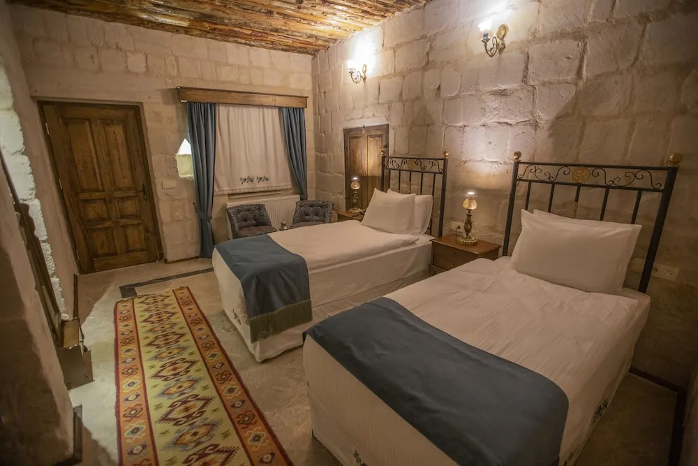Deluxe Tek Büyük veya İki Ayrı Yataklı Oda