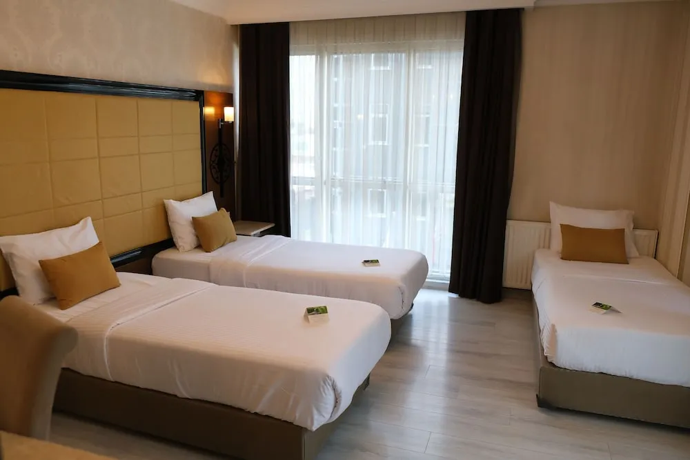 Deluxe Üç Kişilik Oda