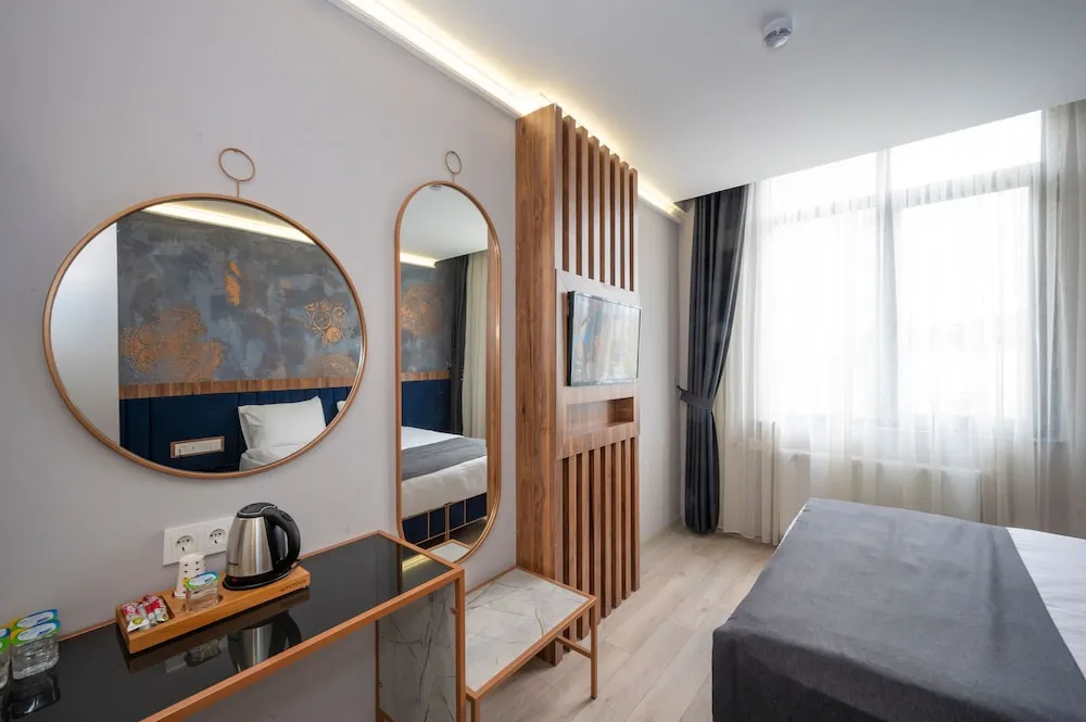 Deluxe Üç Kişilik Oda