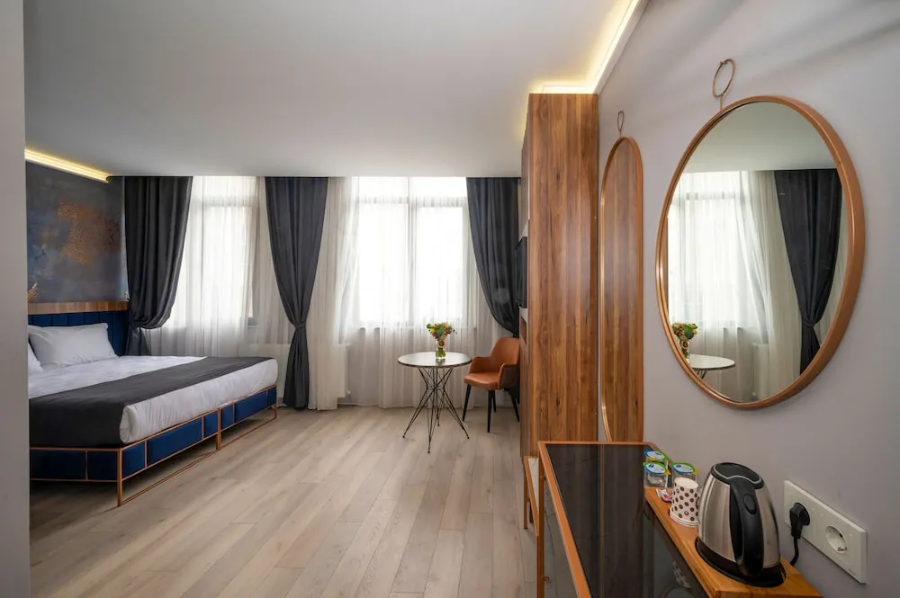 Deluxe Tek Büyük veya İki Ayrı Yataklı Oda