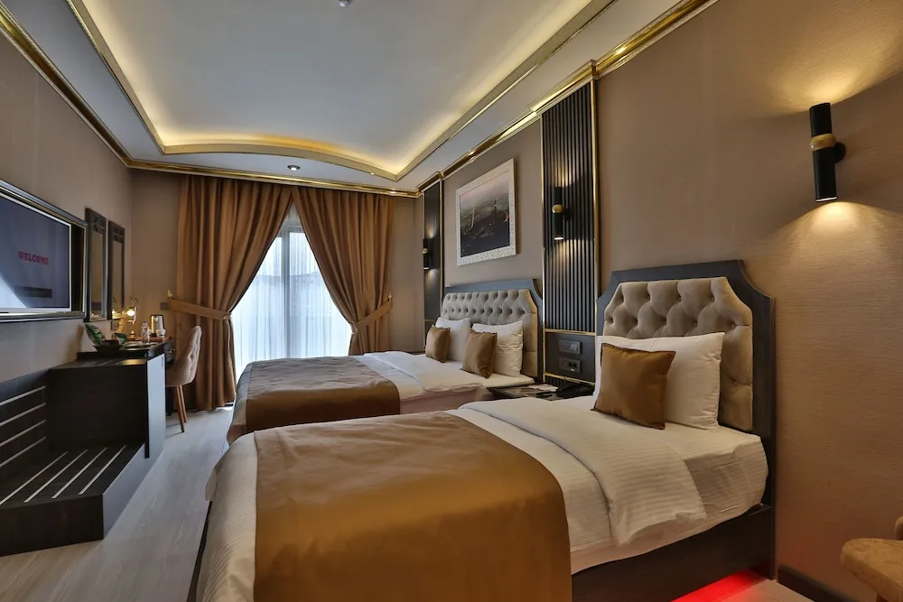 Deluxe Üç Kişilik Oda