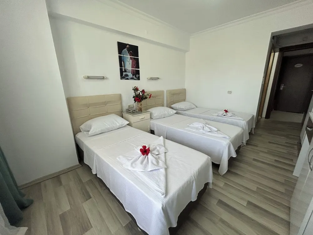 Üç Kişilik Oda