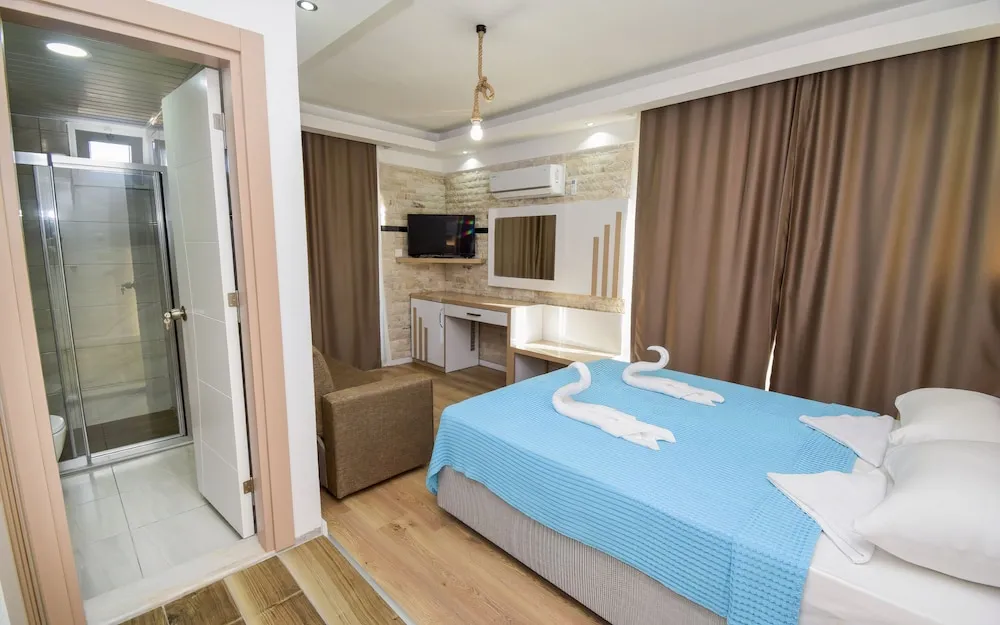 Deluxe Üç Kişilik Oda