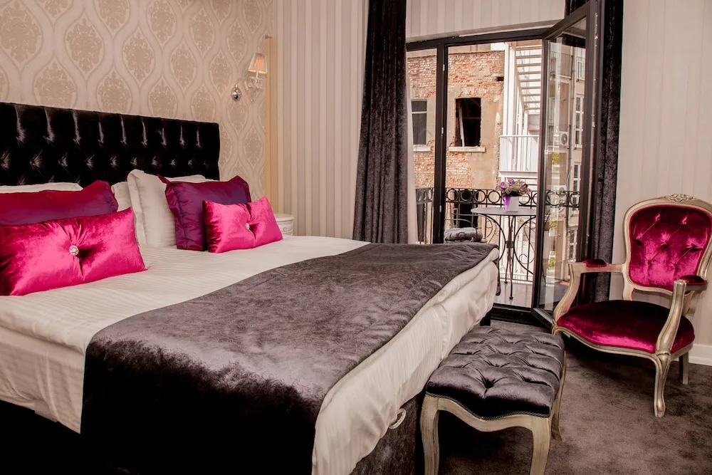 Deluxe Tek Büyük veya İki Ayrı Yataklı Oda, Balkon