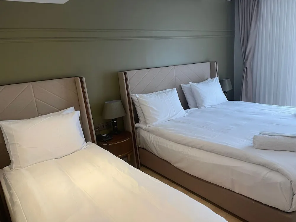 Deluxe Üç Kişilik Oda
