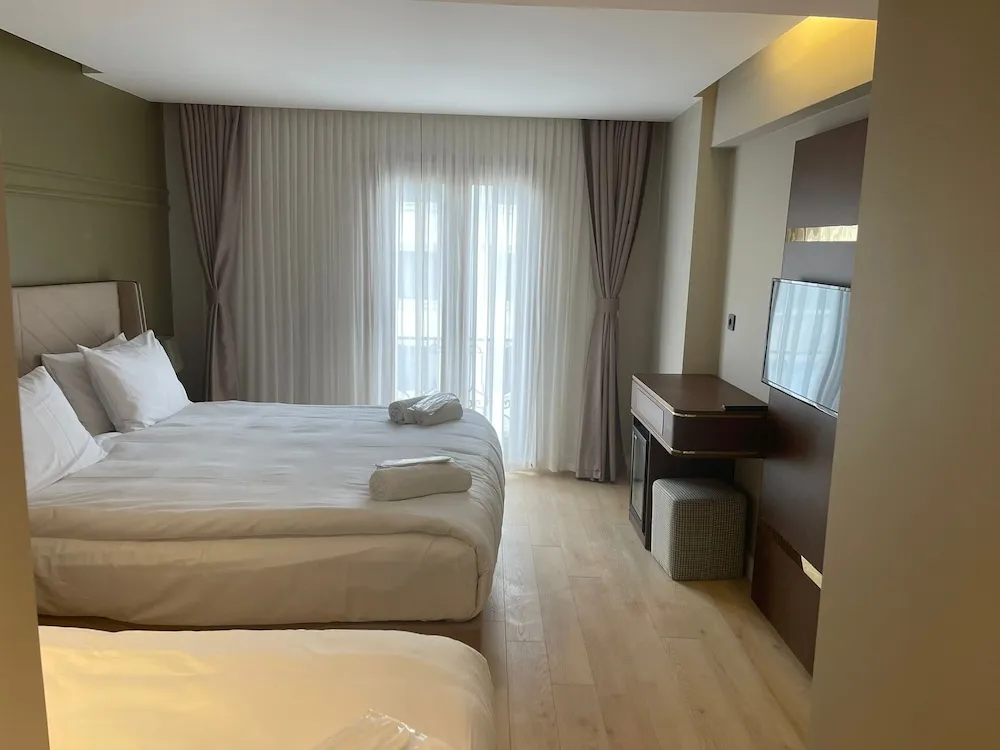 Deluxe Üç Kişilik Oda