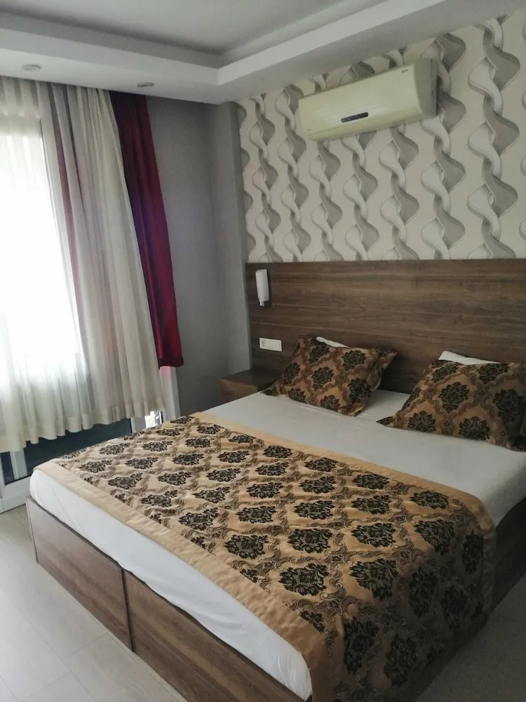 Deluxe Tek Büyük veya İki Ayrı Yataklı Oda