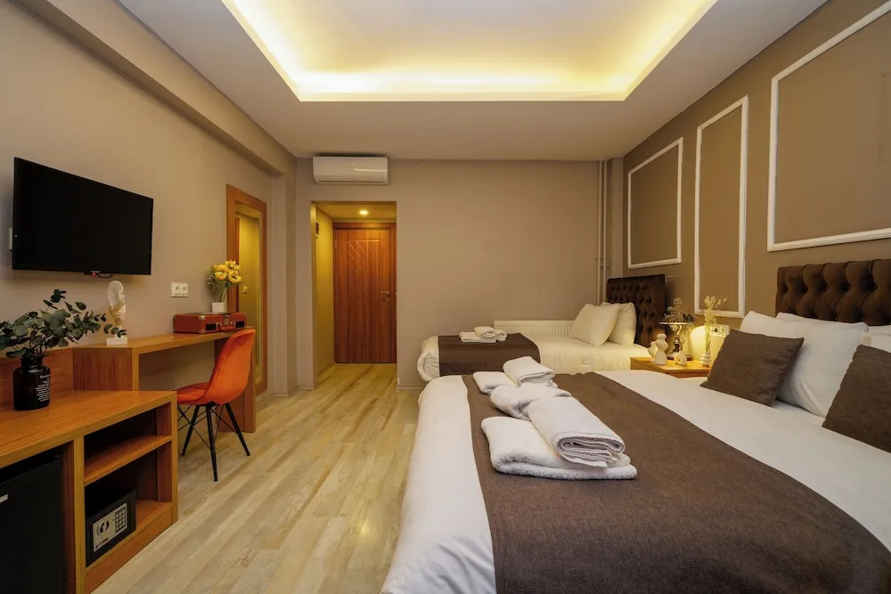 Deluxe Üç Kişilik Oda