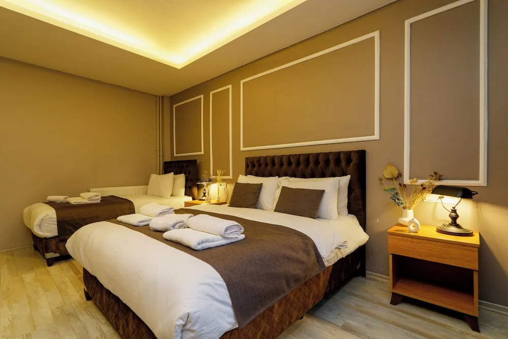 Deluxe Üç Kişilik Oda