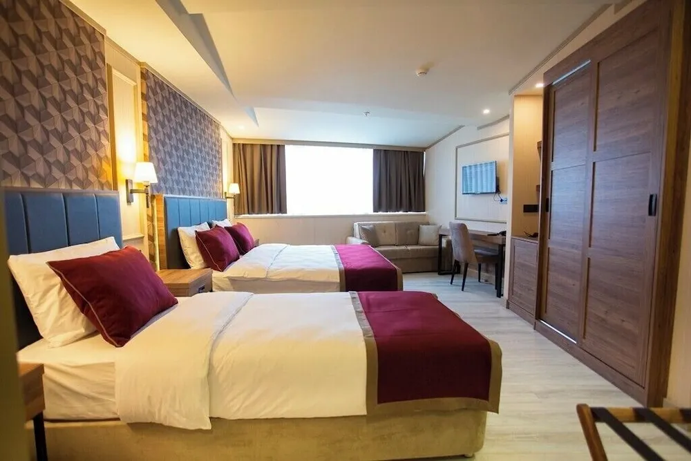 Deluxe Üç Kişilik Oda