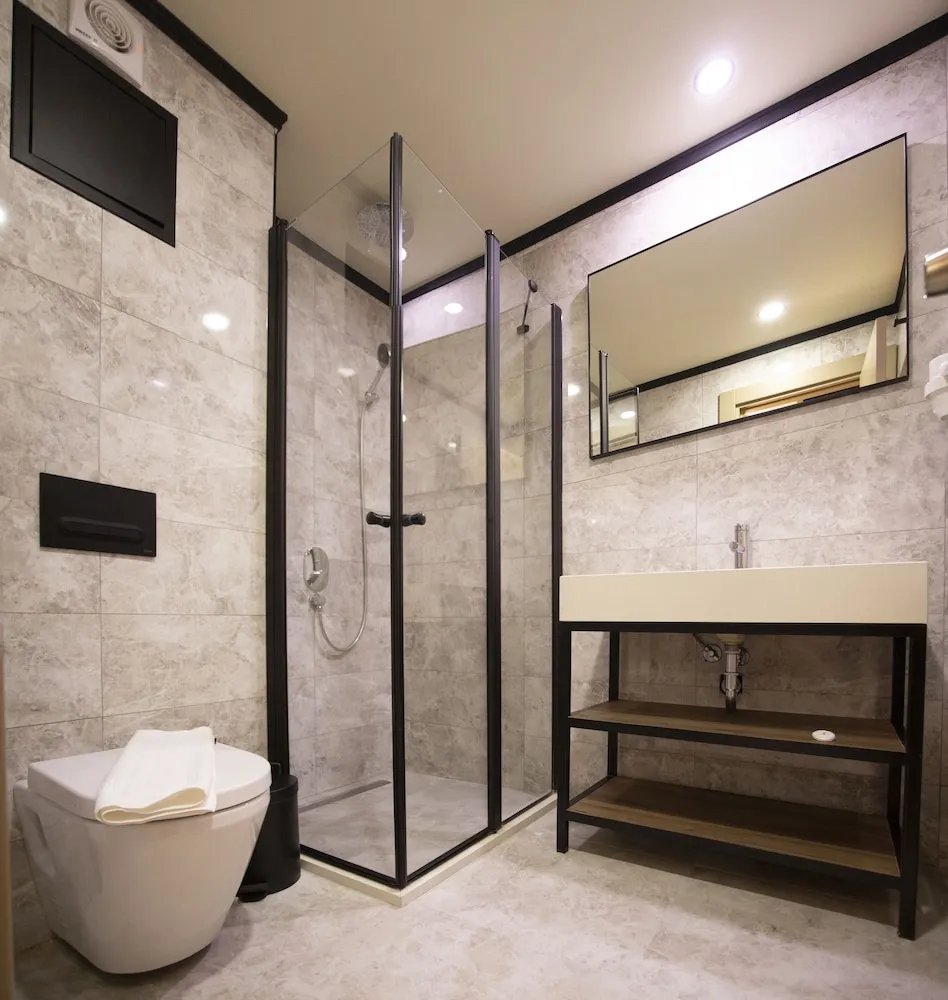 Deluxe Üç Kişilik Oda