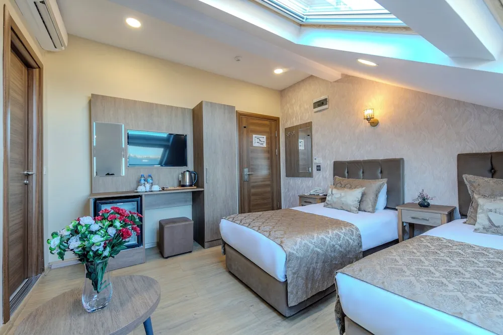Deniz Manzarali Deluxe Tek Büyük veya İki Ayrı Yataklı Oda