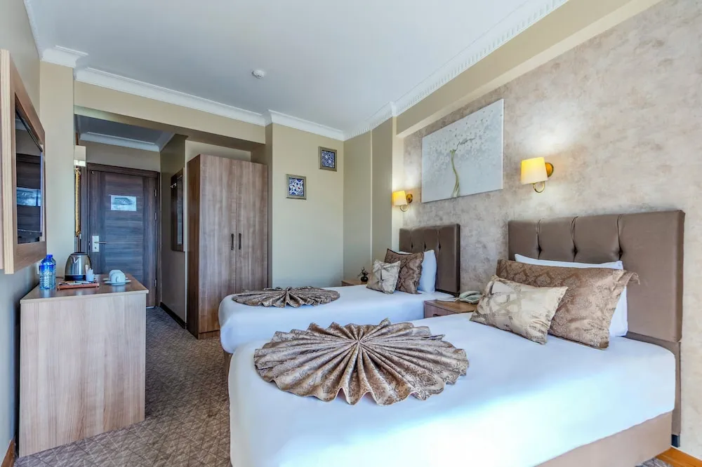 Deniz Manzarali Deluxe Tek Büyük veya İki Ayrı Yataklı Oda
