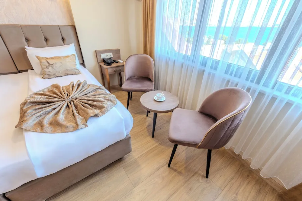 Deniz Manzarali Deluxe Tek Büyük veya İki Ayrı Yataklı Oda