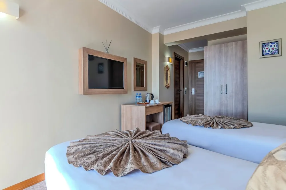Deniz Manzarali Deluxe Tek Büyük veya İki Ayrı Yataklı Oda
