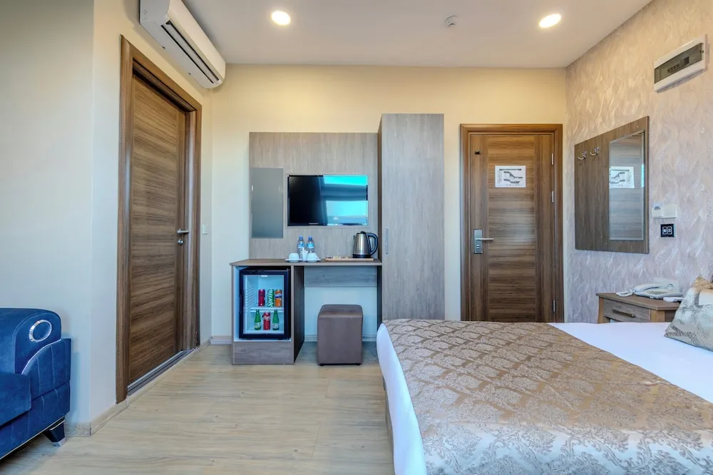 Deniz Manzarali Deluxe Tek Büyük veya İki Ayrı Yataklı Oda