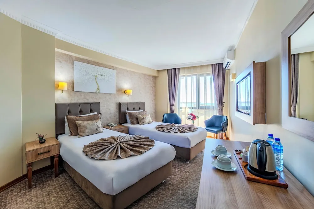 Deniz Manzarali Deluxe Tek Büyük veya İki Ayrı Yataklı Oda