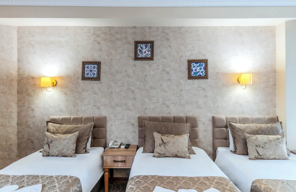 Deluxe Üç Kişilik Oda