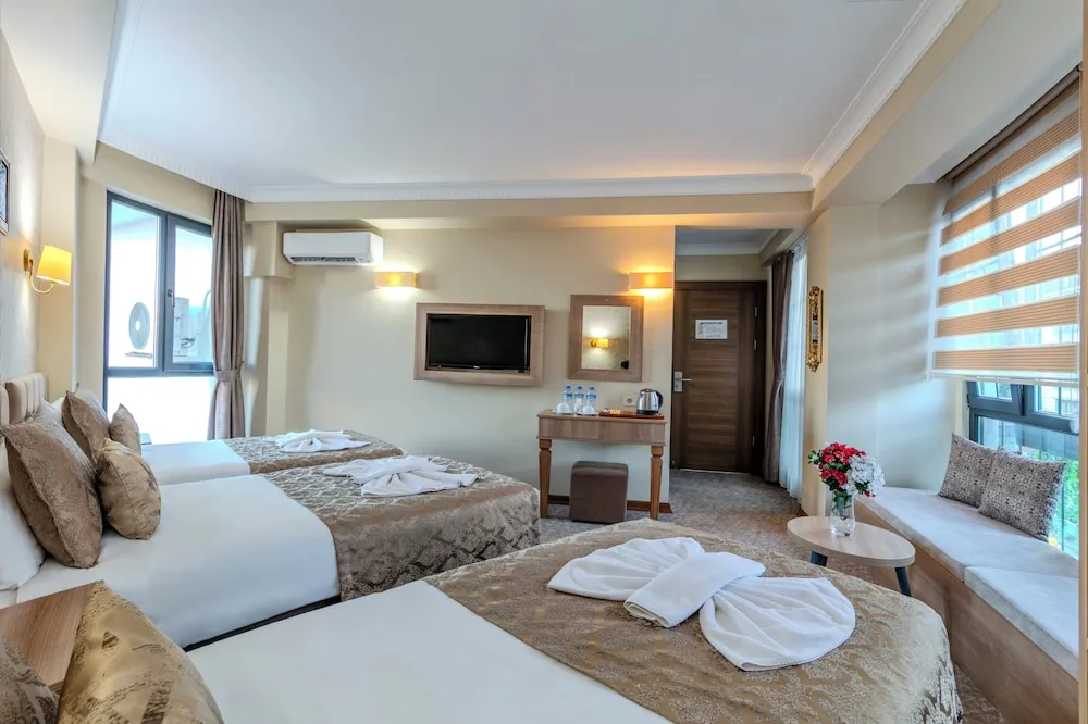 Deluxe Üç Kişilik Oda