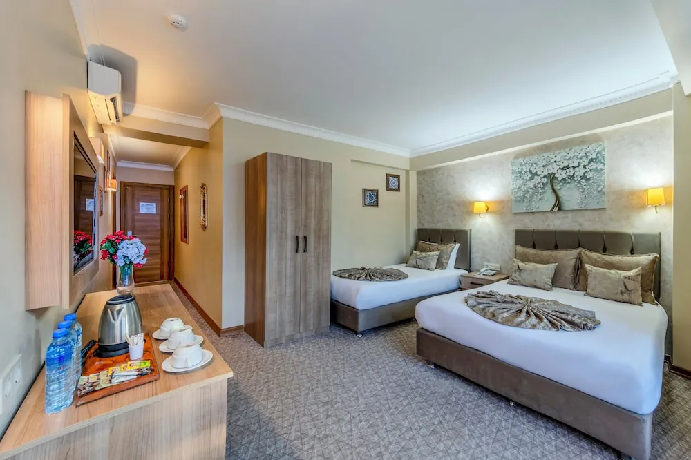 Deluxe Üç Kişilik Oda
