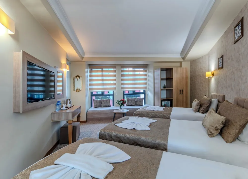 Deluxe Üç Kişilik Oda