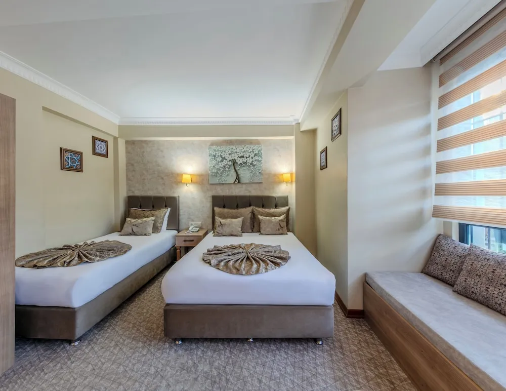 Deluxe Üç Kişilik Oda