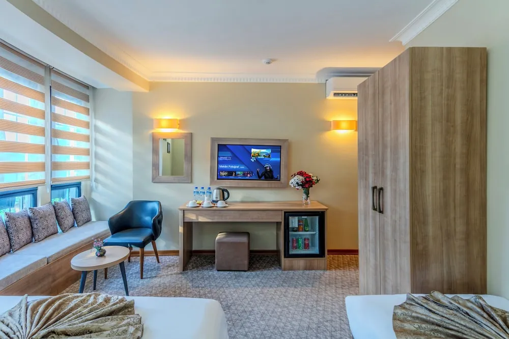 Deluxe Üç Kişilik Oda