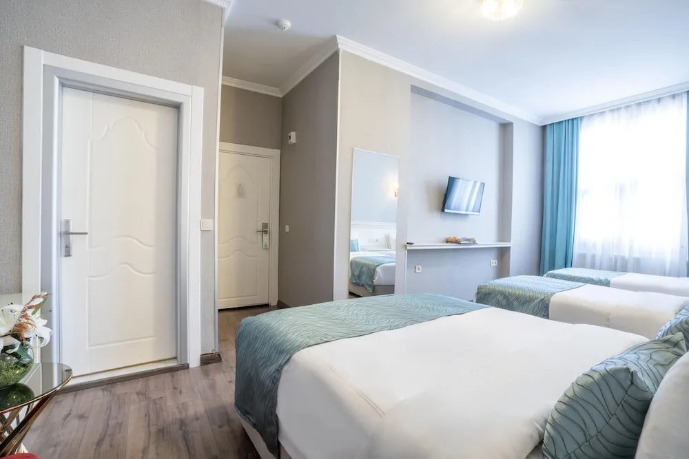 Family Üç Kişilik Oda