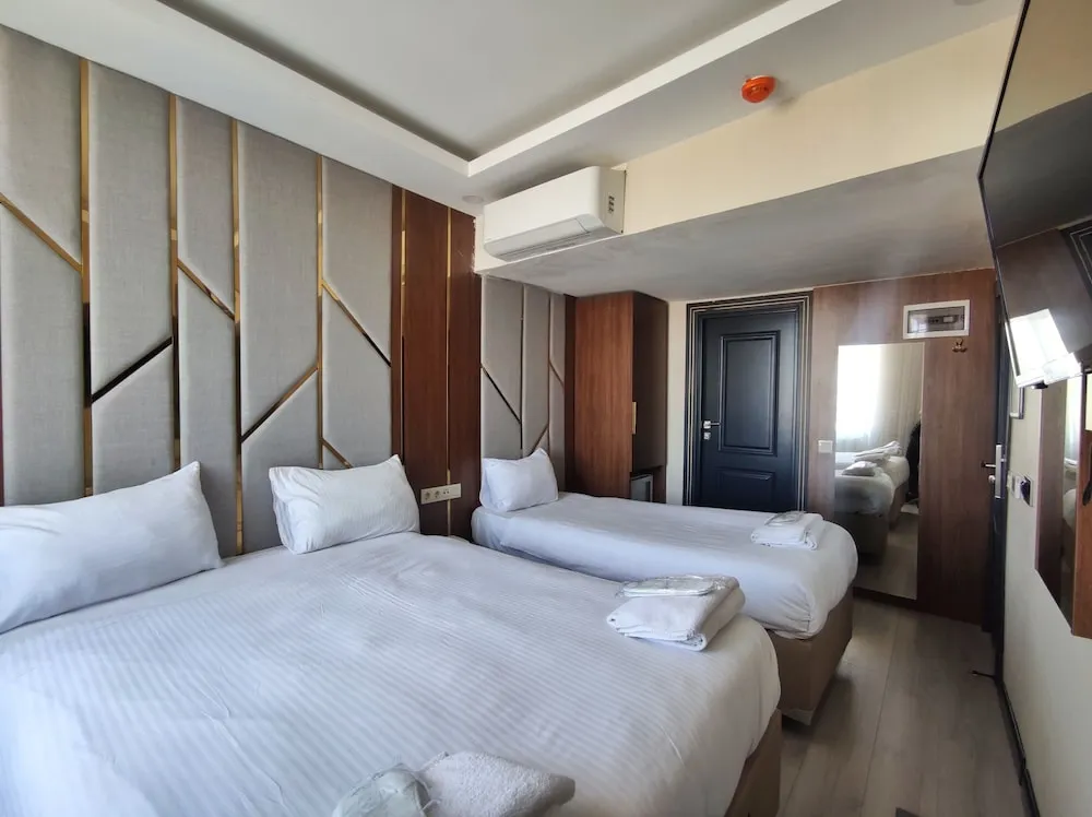 Economy Üç Kişilik Oda