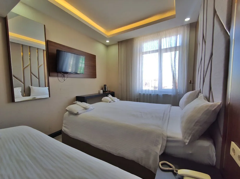 Economy Üç Kişilik Oda