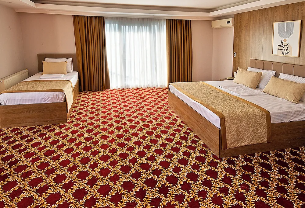 Deluxe Dört Kişilik Oda